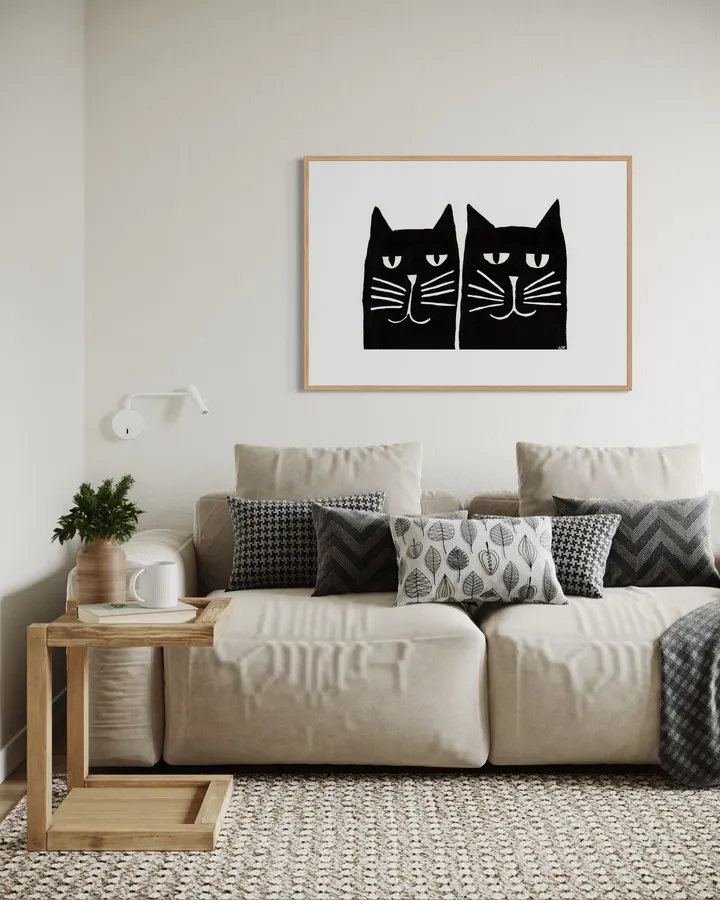 Two black cats. - Nancy McKie